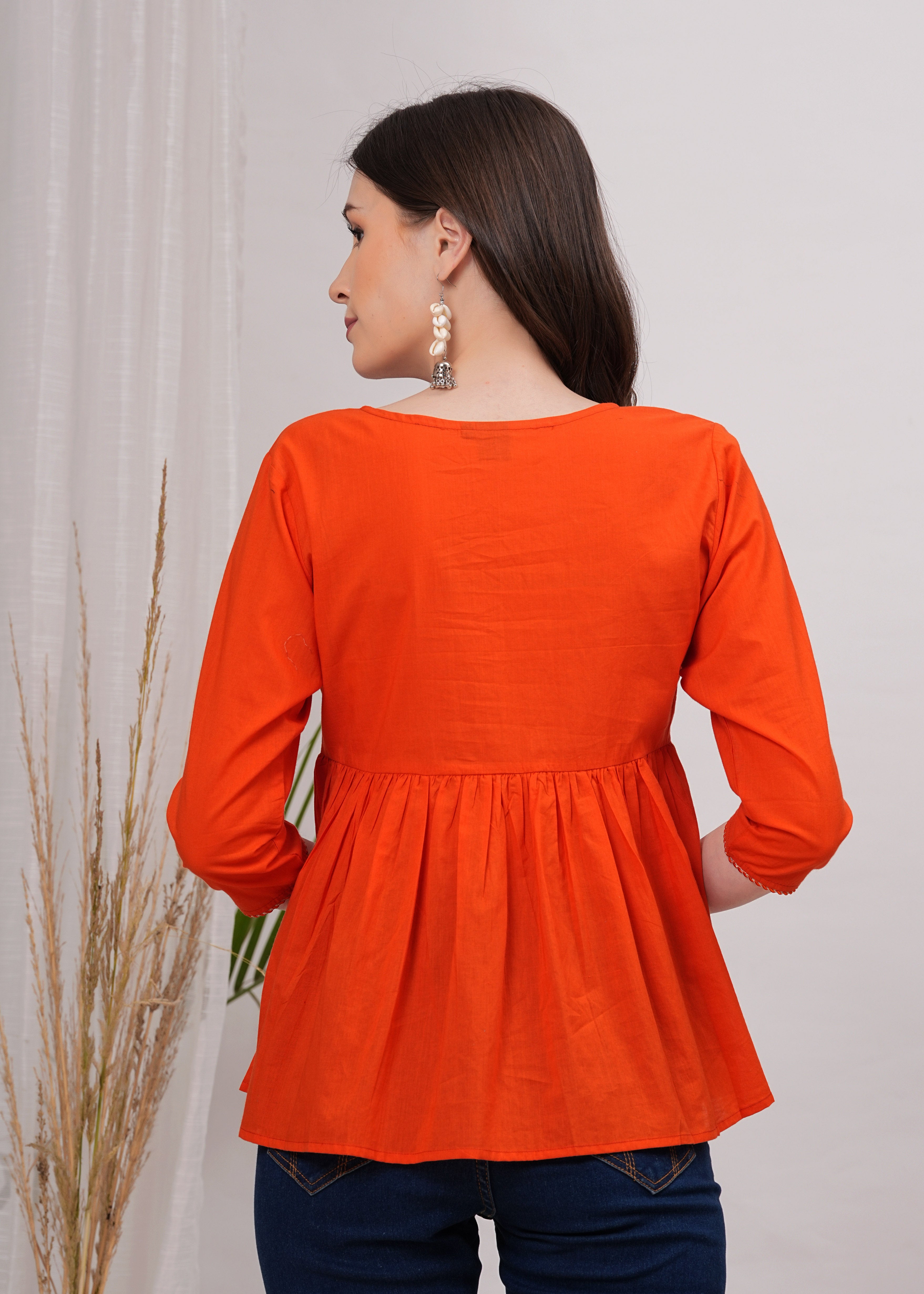 Tangerine Diamond Peplum Top