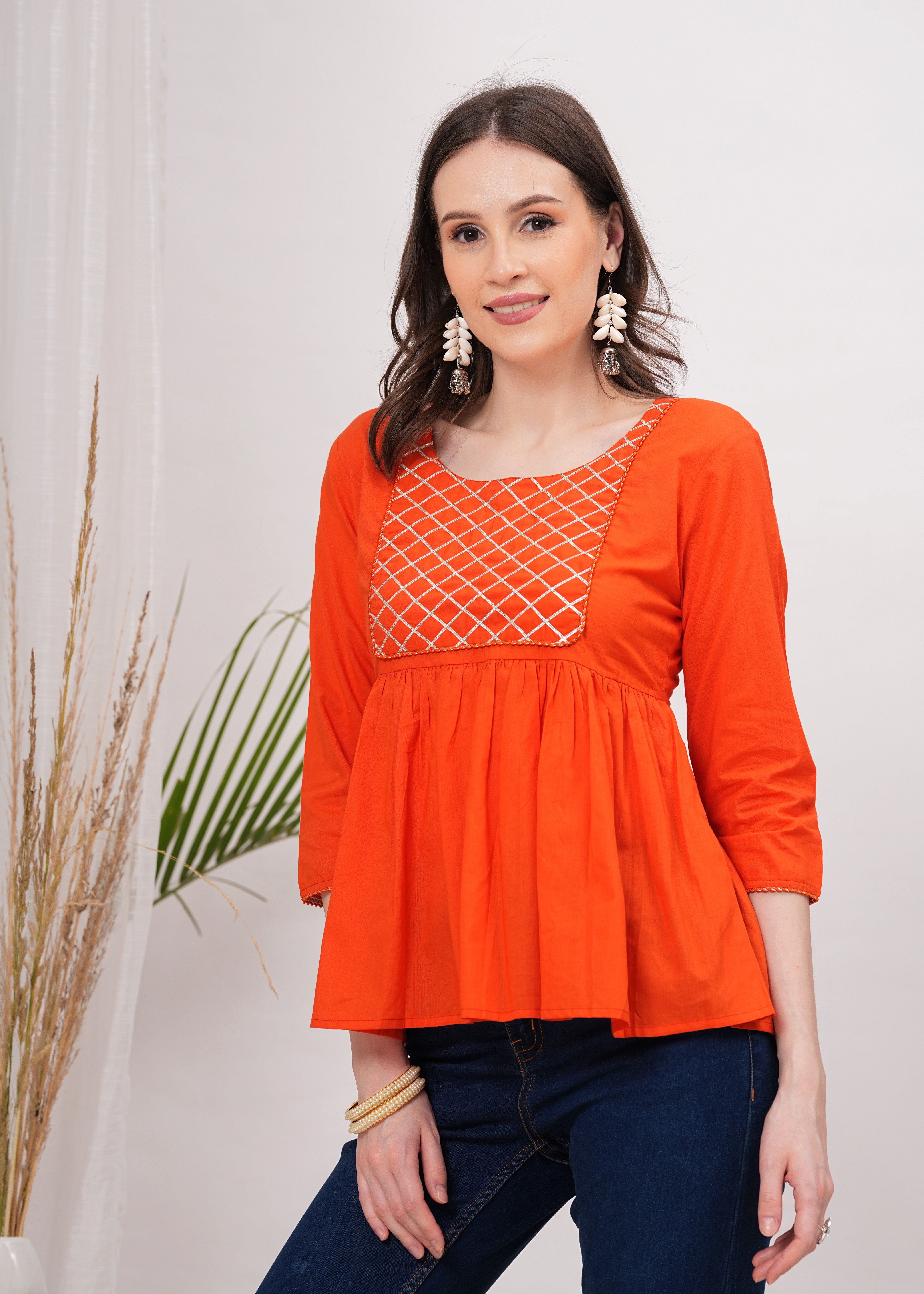 Tangerine Diamond Peplum Top