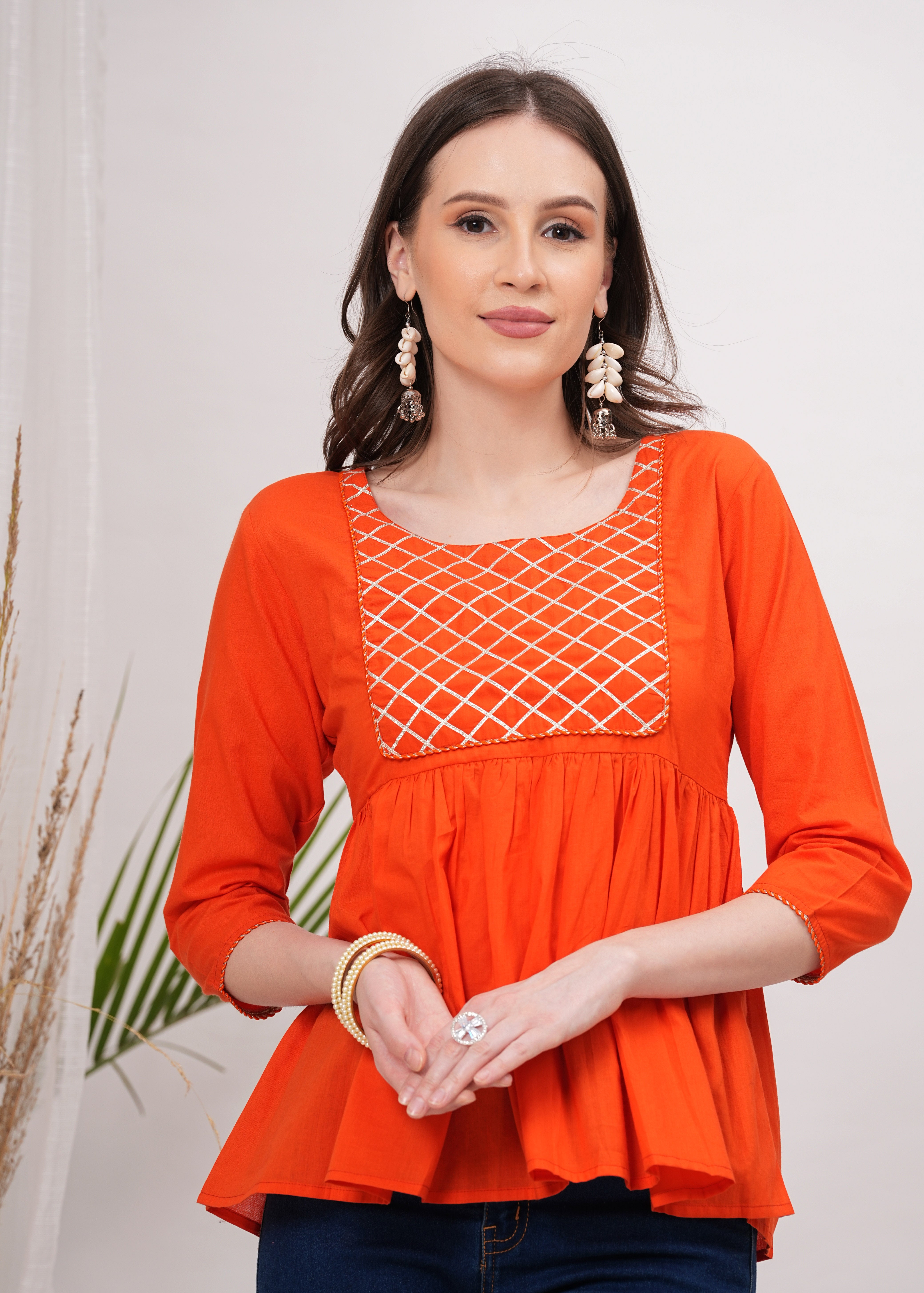 Tangerine Diamond Peplum Top