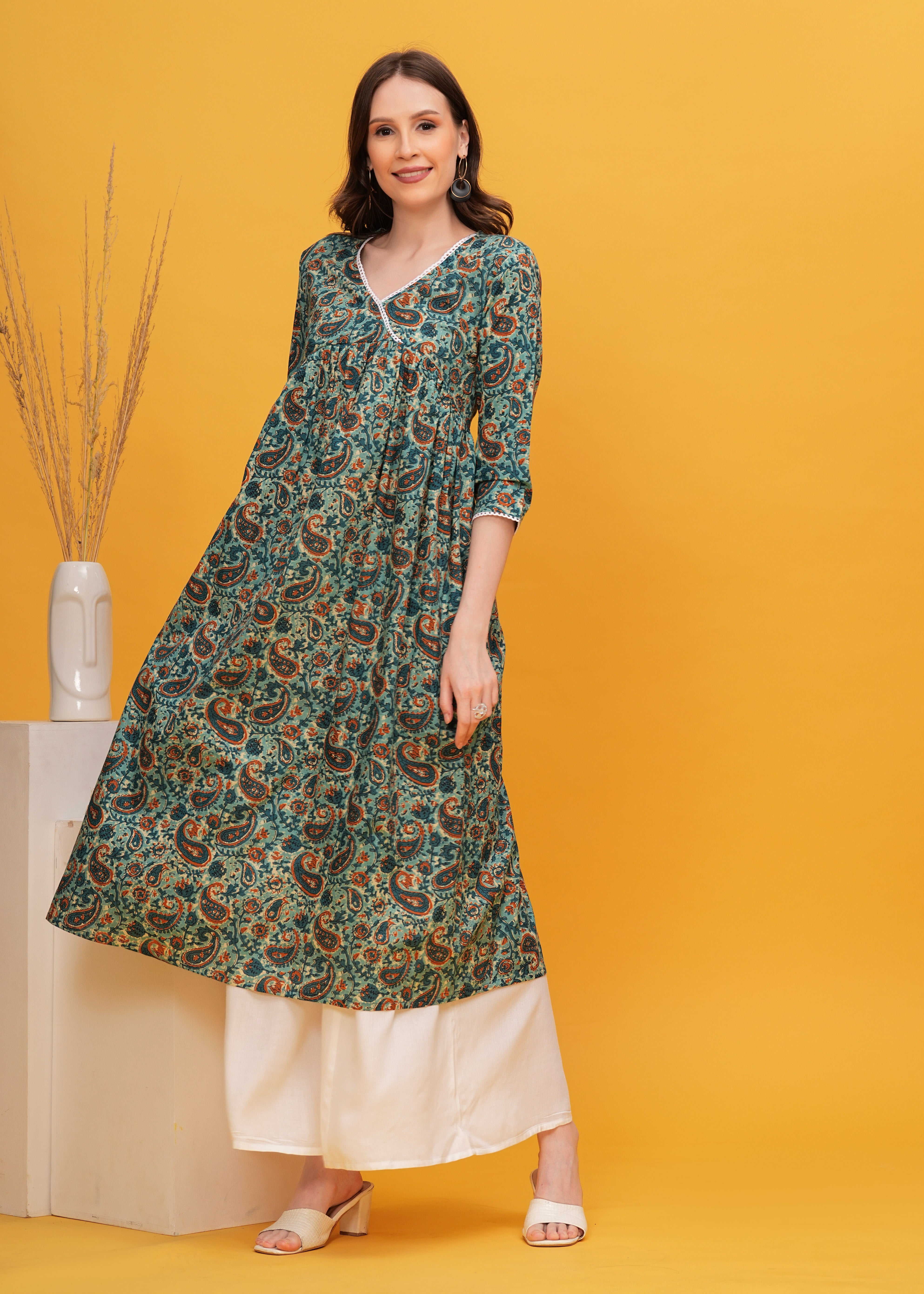 Nature's Touch: Experience Elegance with  Flared Alia Cut Green Printed Kurti -Perfect for Effortless Style