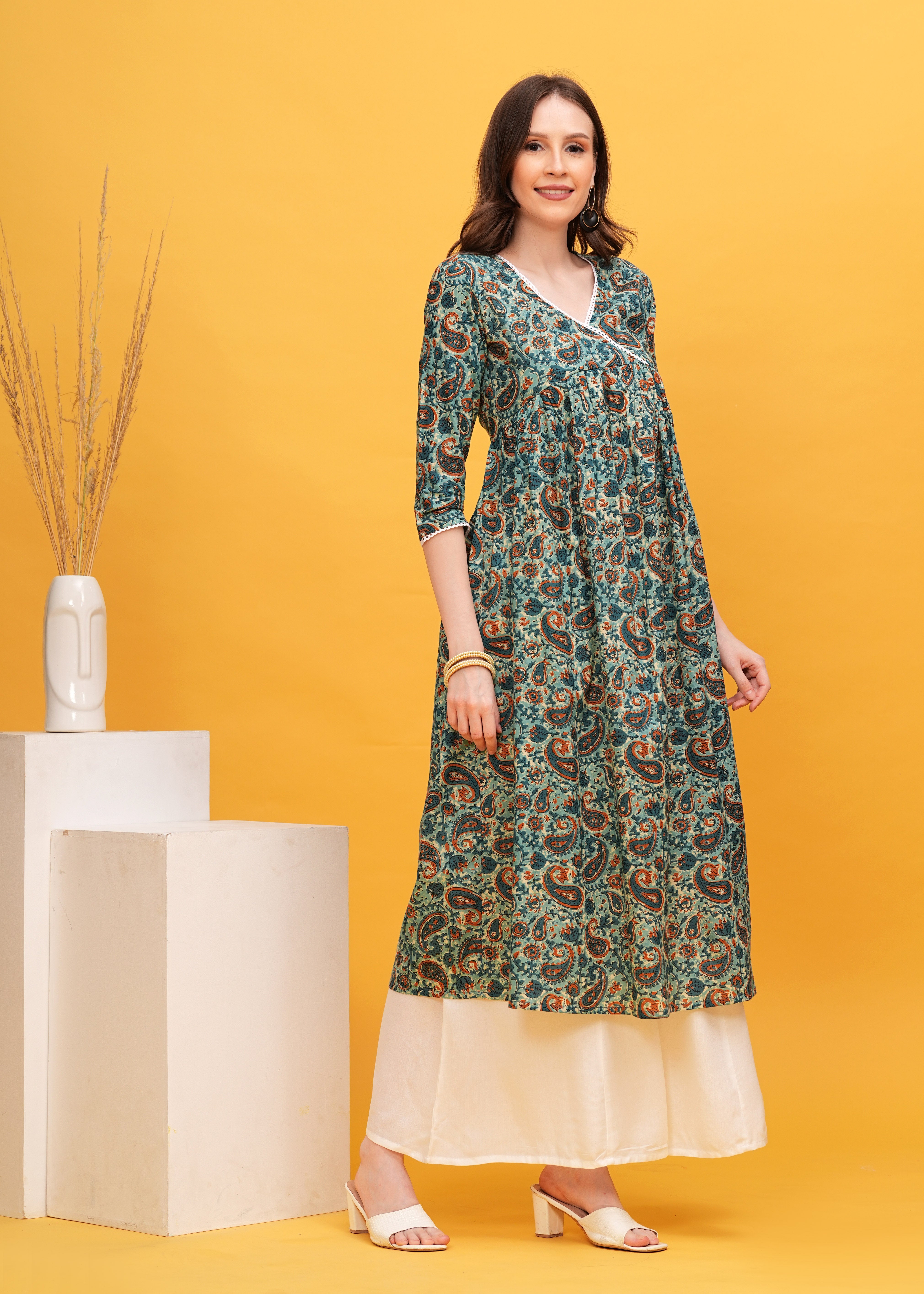 Nature's Touch: Experience Elegance with  Flared Alia Cut Green Printed Kurti -Perfect for Effortless Style