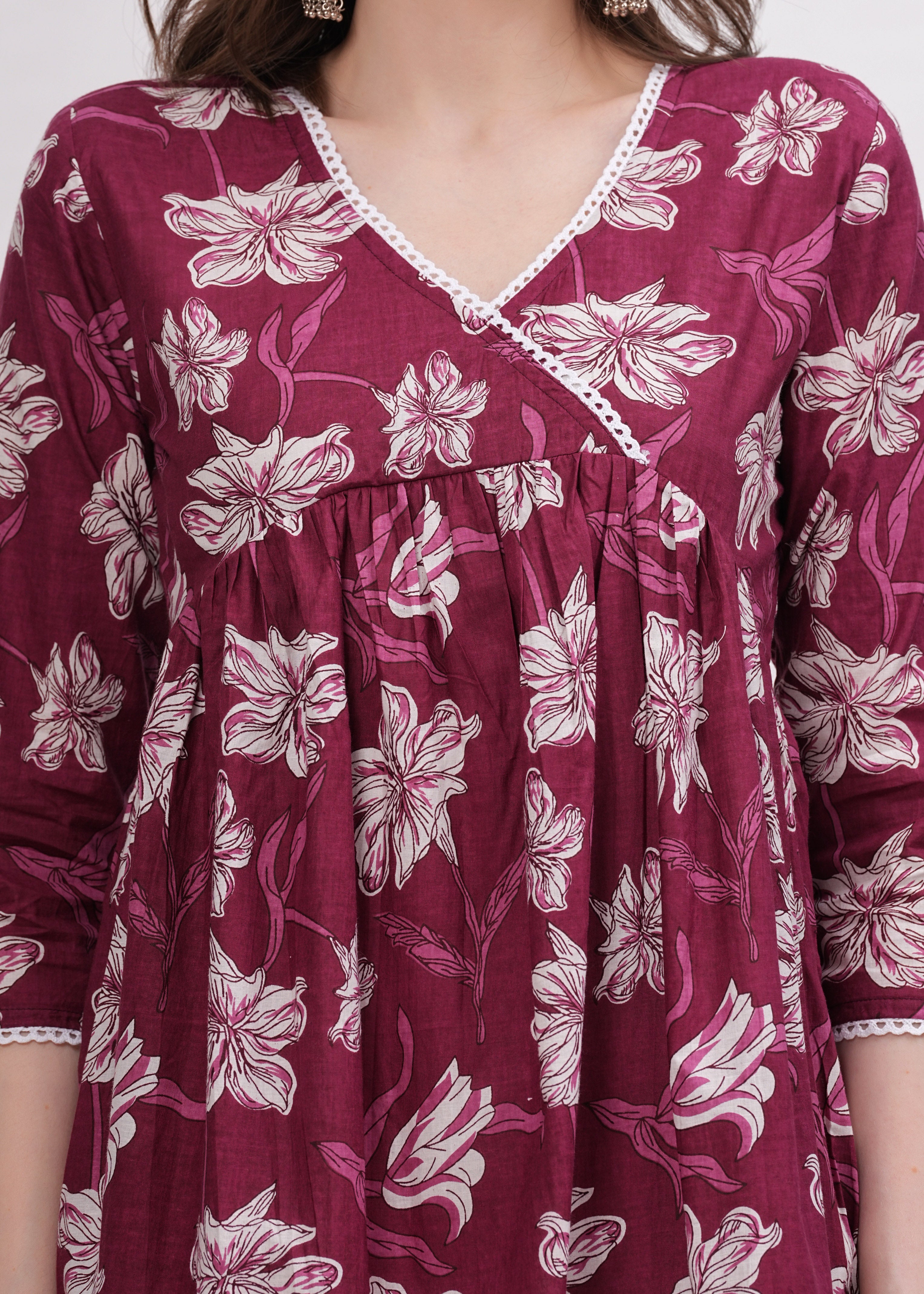 Elegant Flared Maroon Cotton Long Kurti with Artistic Prints and Stylish Neckline - Perfect Blend of Comfort and Chic Ethnic Fashion
