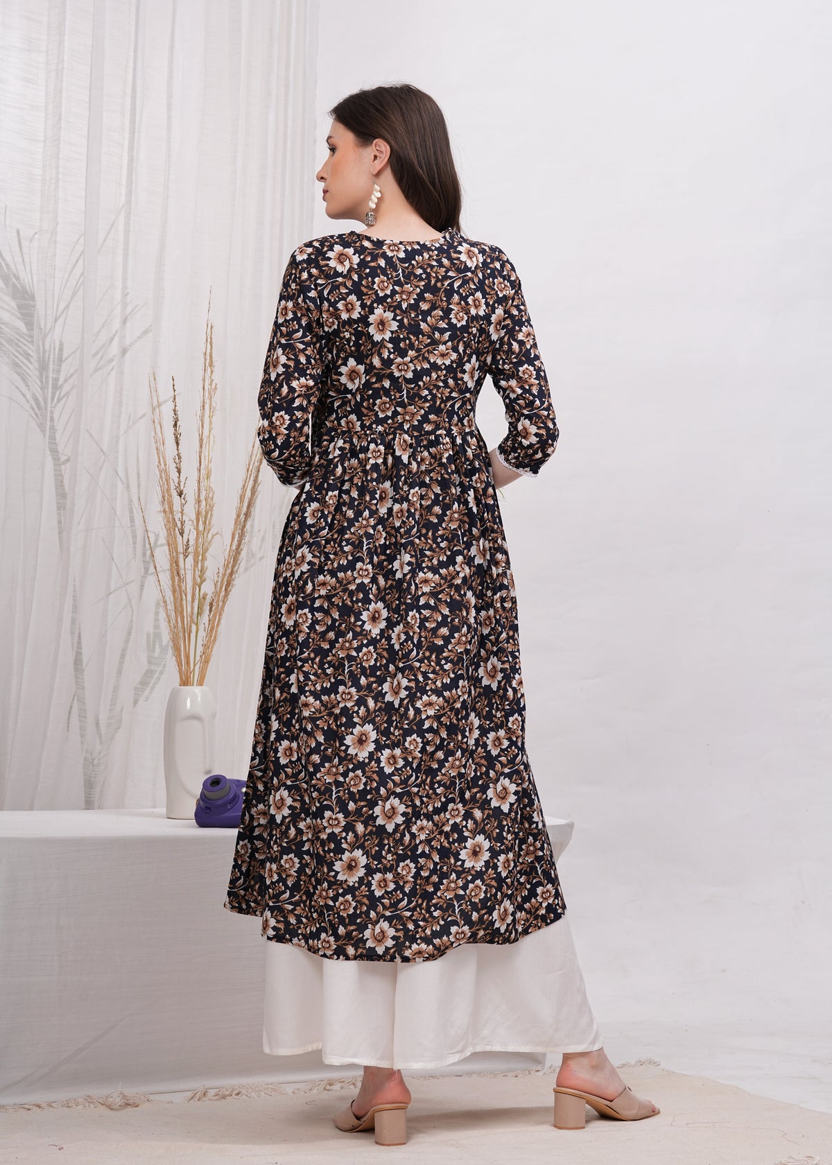 Perfect Blend of Elegance and Chic in  Black Printed - Stunning White and Brown Flower