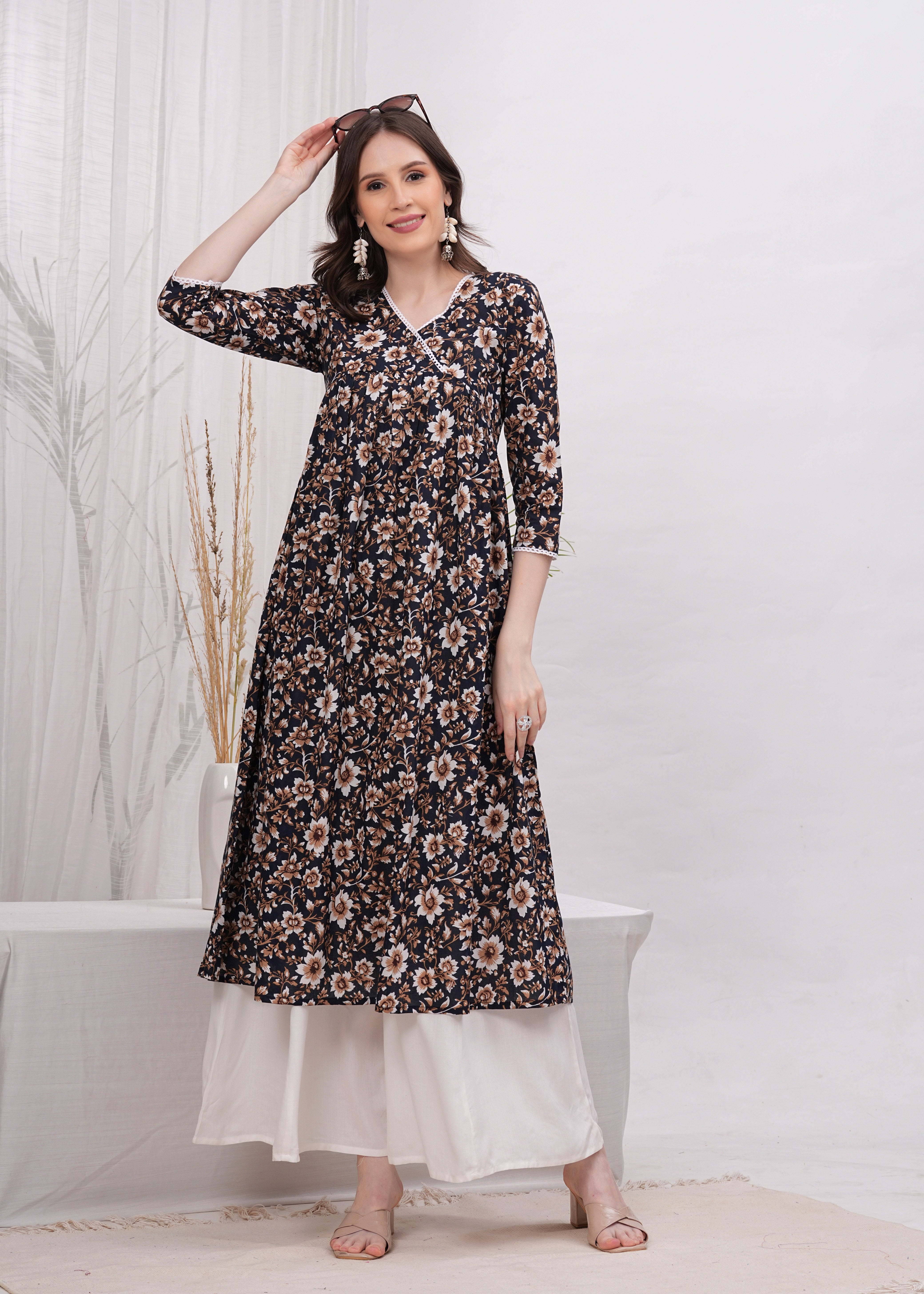 Perfect Blend of Elegance and Chic in  Black Printed - Stunning White and Brown Flower
