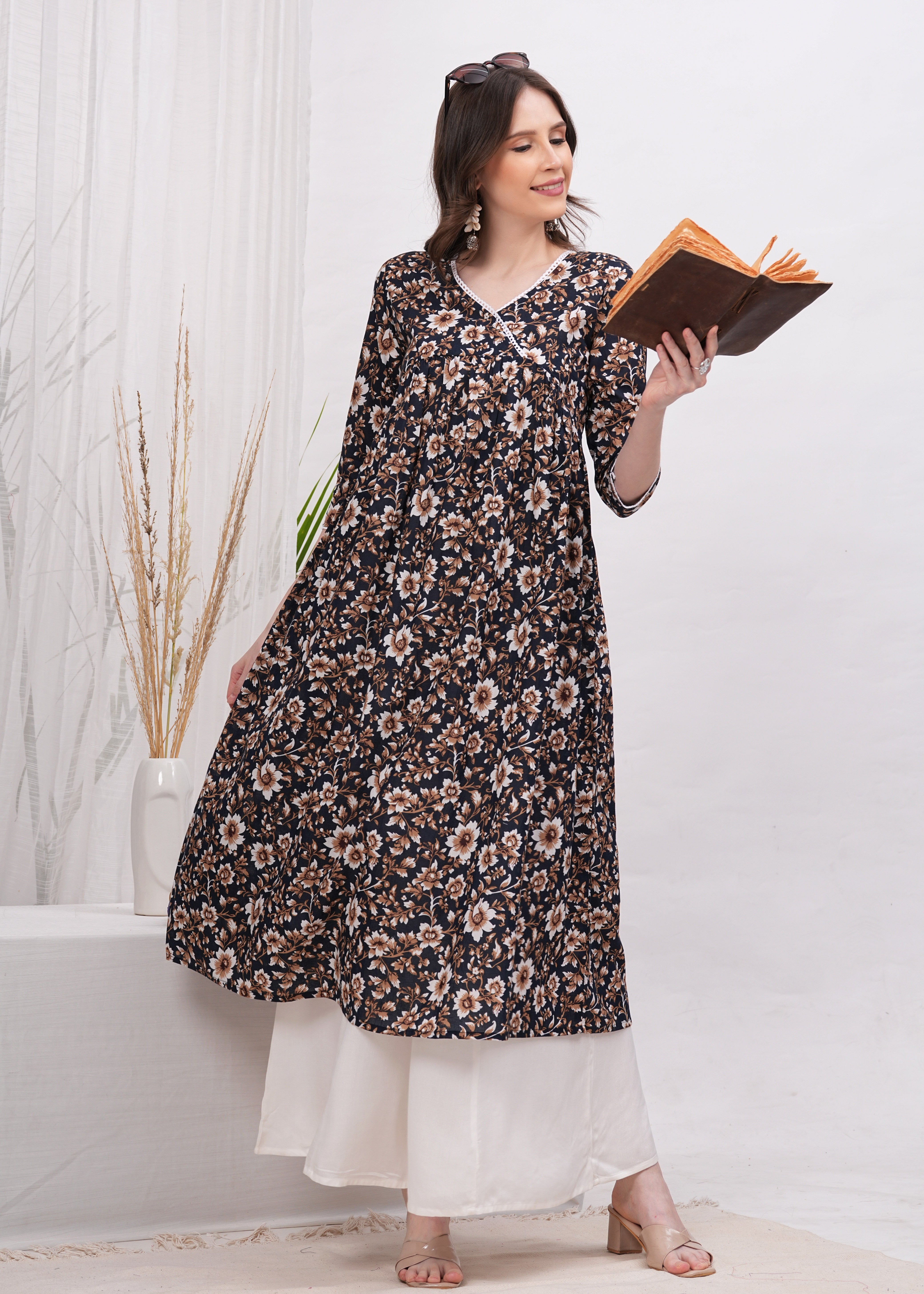 Perfect Blend of Elegance and Chic in  Black Printed - Stunning White and Brown Flower