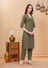 Embrace timeless elegance with our Olive Green Kurta Pant Set, a perfect blend of style and comfort
