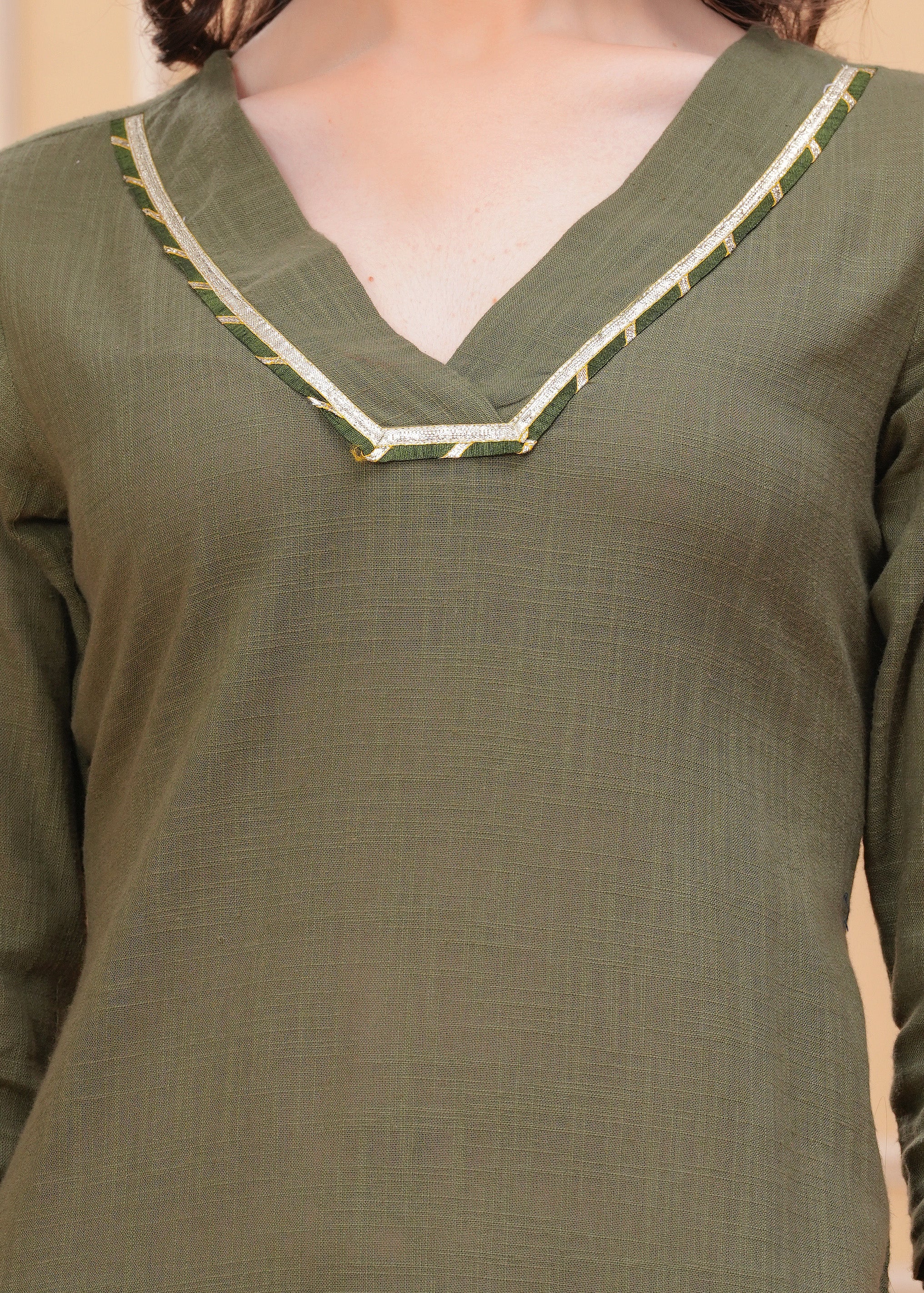 Embrace timeless elegance with our Olive Green Kurta Pant Set, a perfect blend of style and comfort